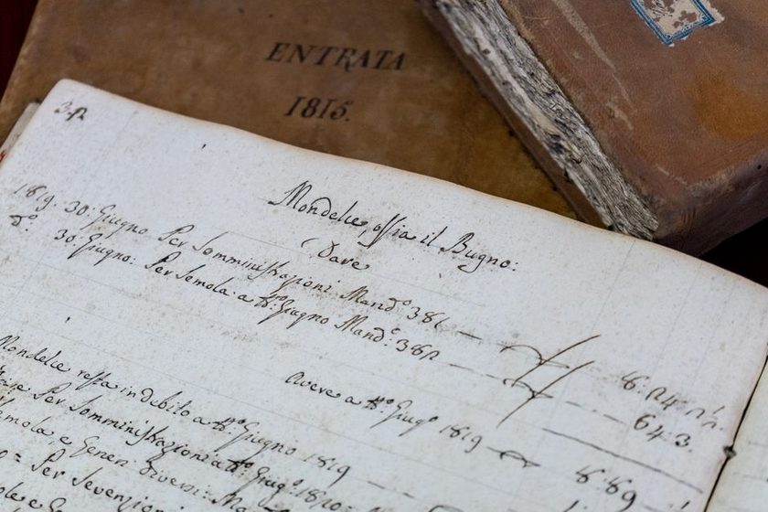 An antique ruled ledger page showing the printed column lines